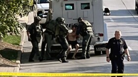 BPD: The man is currently in police custody and is being removed from the storm drain.