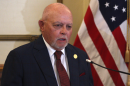 Rep. Doug Miller (R-Elkhart) expresses frustration at local pushback to his work to make housing more affordable. Pictured here on April 13th during a ceremonial signing for HB 1001 at the statehouse.