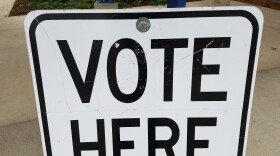 "Vote here" sign