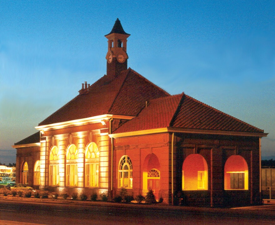 Abbey Station in Rock Island lit up at night.