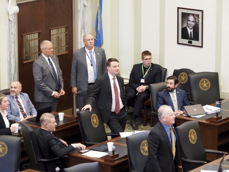 House Speaker Kyle Hilbert, R-Bristow, center, and other state lawmakers listen to proceedings Monday in the House chamber of the state Capitol in Oklahoma City. The House on Monday passed major legislation affecting reading instruction in public schools.
