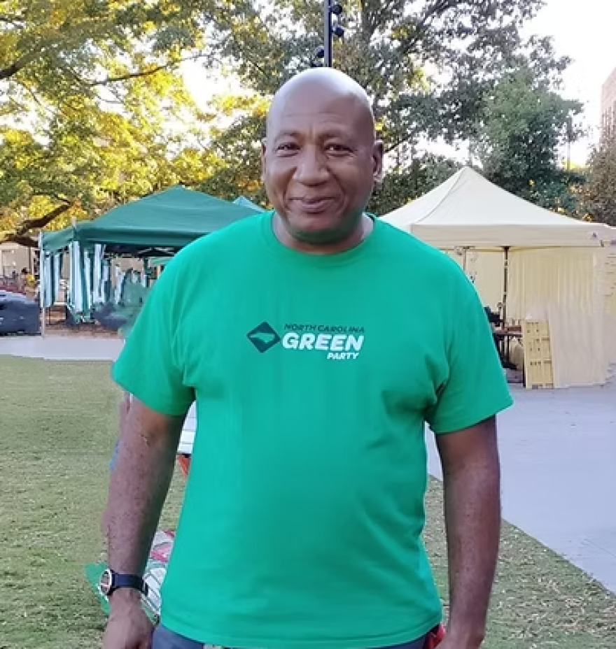 Man outside in green shirt