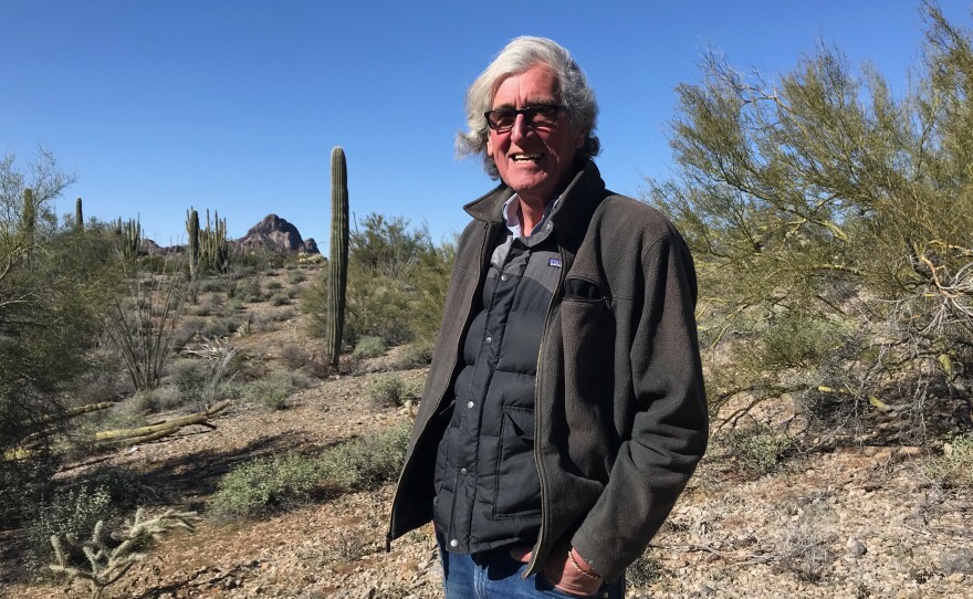 John Orlwoski, a migrant aid volunteer, in the desert outside Ajo, Ariz.