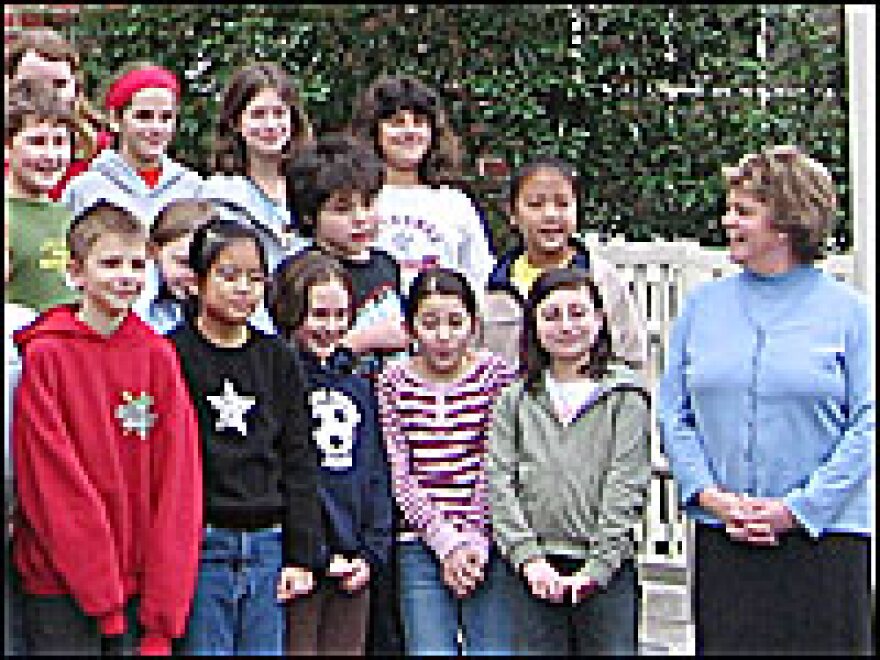 Judy Towler with her fourth-grade class at Bryant Elementary School.