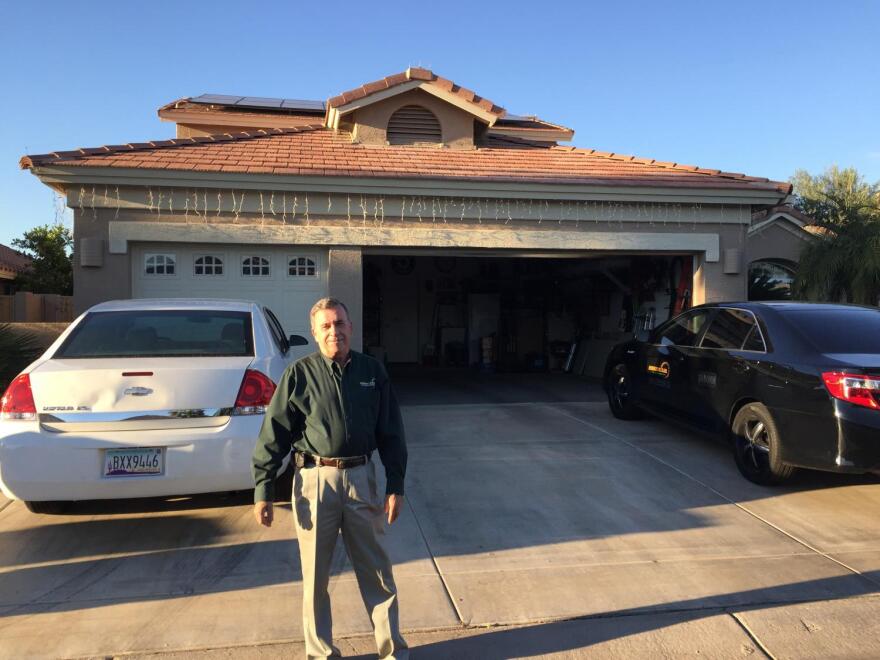 Charlie Miller stands in front of his home in the retirement community of Pebble Creek, west of Phoenix. Miller is one of the many Republicans who have embraced solar in Arizona