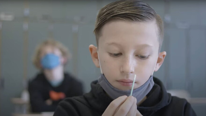 kid with swab