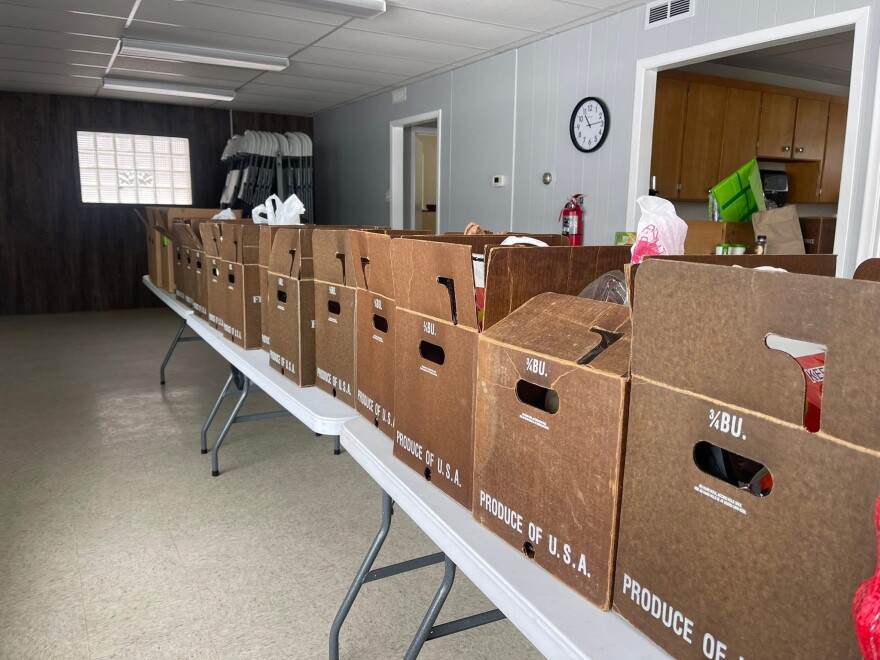 Boxes of local food sit ready for distribution for the Virginia Farmers Market Hub.