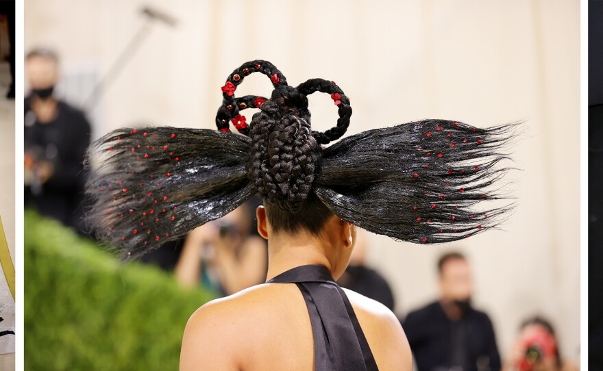 New York Rep. Carolyn B. Maloney sports a look promoting the Equal Rights Amendment; co-chair Naomi Osaka wears a Nicolas Ghesquière for Louis Vuitton suit; Kris Jenner carries a ball-and-chain bag.