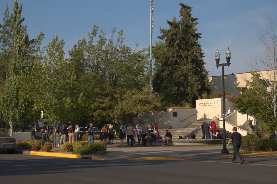 Community members gathered at Springfield City Hall on Aug. 14, 2026 to denounce ICE activity in the area.