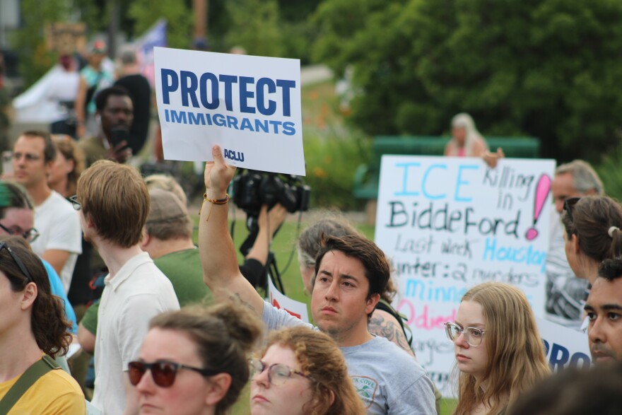 Protestors gather in Mechanics Park in Biddeford for a vigil honoring Johan Sebastián Durán Guerrero, 25, who was killed by federal immigration agents on the morning of July 13, 2026.