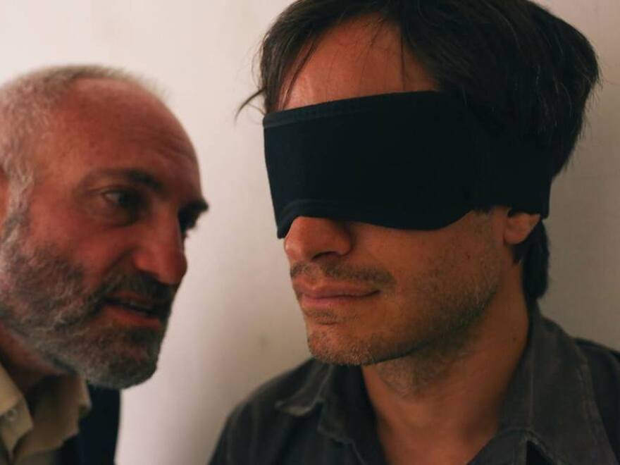 Gael Garcia Bernal is an imprisoned Iranian journalist in Jon Stewart's directorial debut, <em>Rosewater.</em>