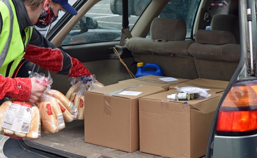 Loading a car with food