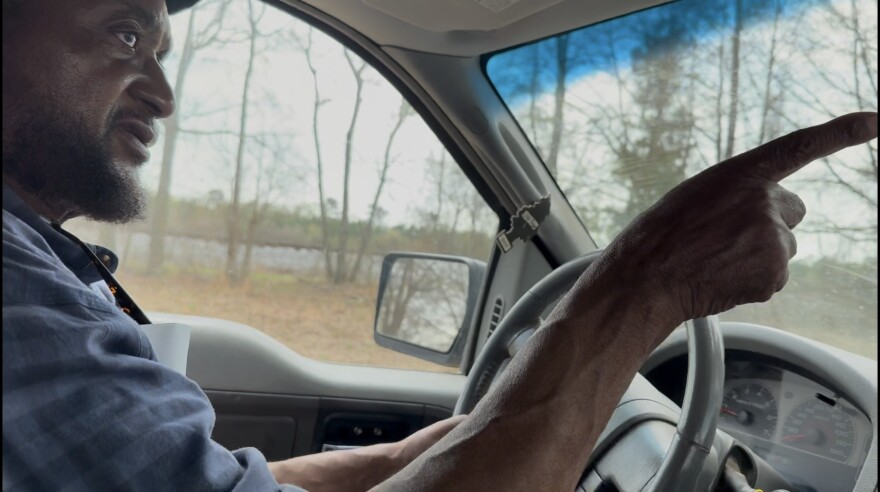 David Batts points to a proposed data center site in Edgecombe County's Kingsboro community. Batts mounted a successful primary challenge to a 16-year incumbent, focusing primarily on opposition to the data center.