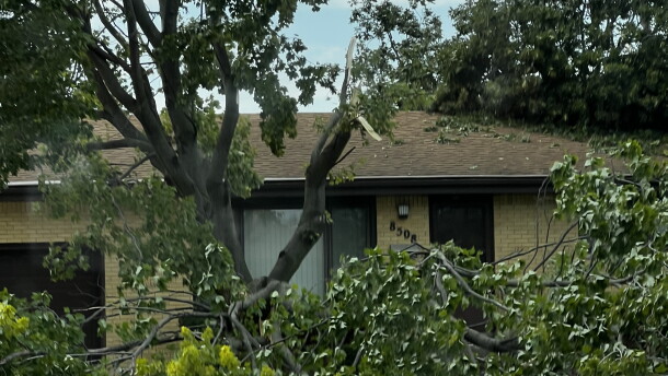 A Munster, Ind., home sits damaged in the aftermath of the severe storms that tore across Northwest Indiana on Aug. 11, 2026.