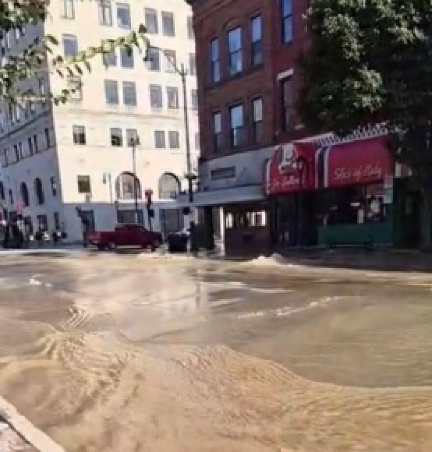 Water flooded the street Thursday after a 24-inch water transmission main broke in downtown Springfield.