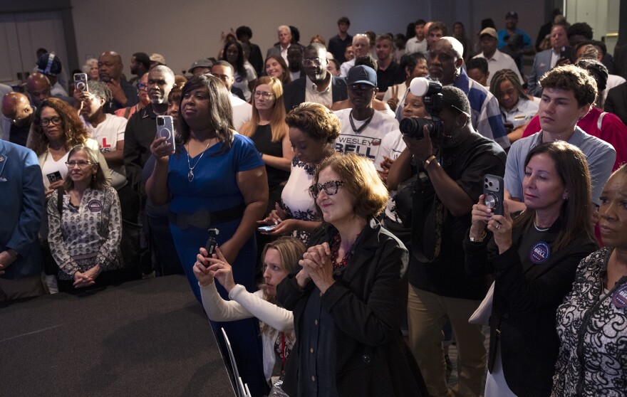 Supporters listen to U.S. Rep. Wesley Bell, D-St. Louis County, as he speaks after defeating former U.S. Rep. Cori Bush in Missouri's Democratic primary at Bell’s election night watch party at the Marriott St. Louis Grand on Tuesday, Aug. 4, 2026, in downtown St. Louis.