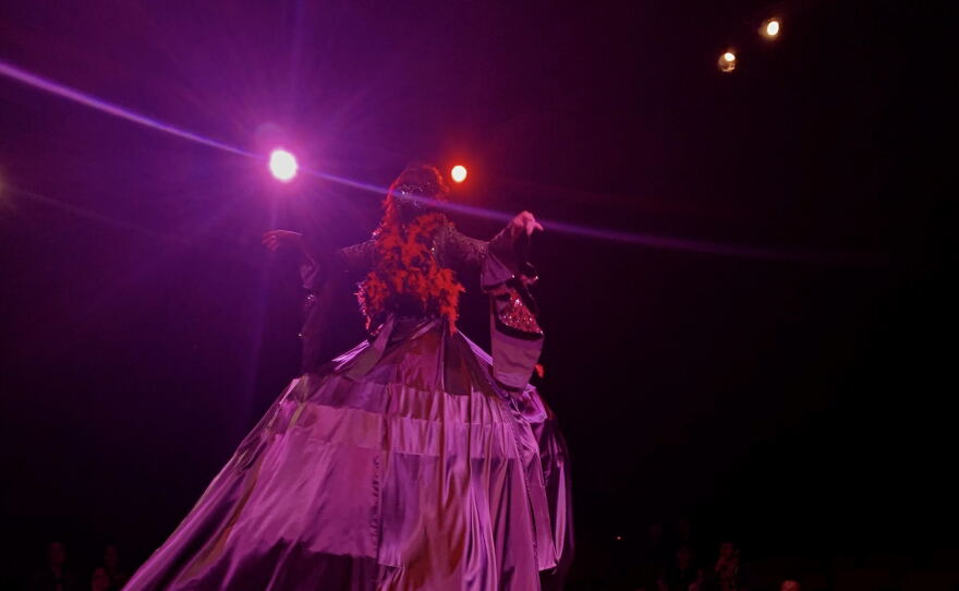 Allison Gale performs a burlesque number on stilts as Gale Force.