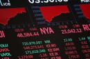 Stock market numbers are displayed on the floor of the New York Stock Exchange during afternoon trading on March 3 in New York City.