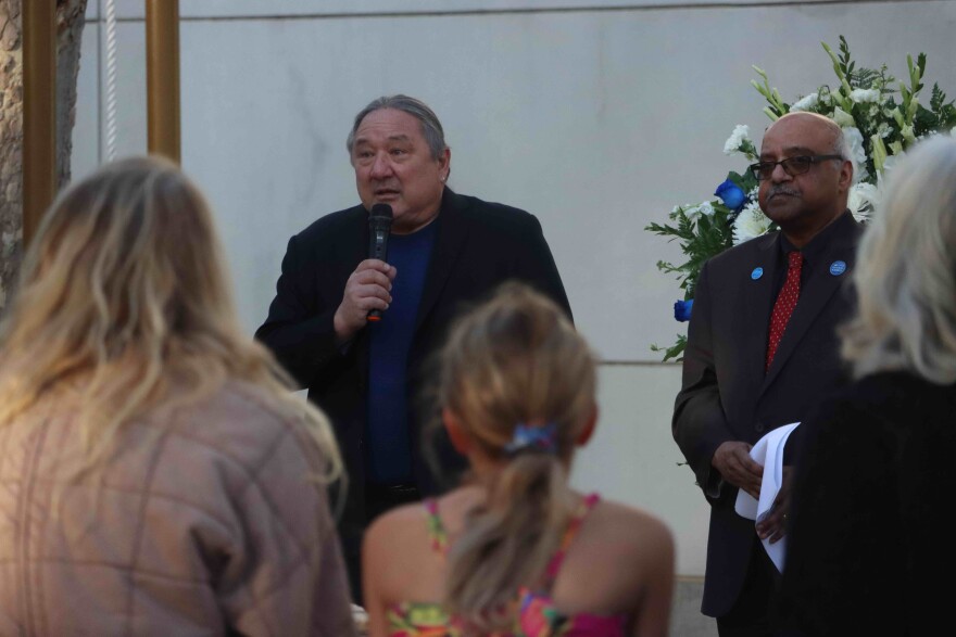 Cal State San Bernardino Professor Stuart Sumida, left, and Dr. Sastry Pantula, the dean of CSUSB’s College of Natural Sciences, speaking during the college's annual remembrance ceremony at the Peace Garden near the Chemical Sciences building on Tuesday, Dec. 2, 2025.