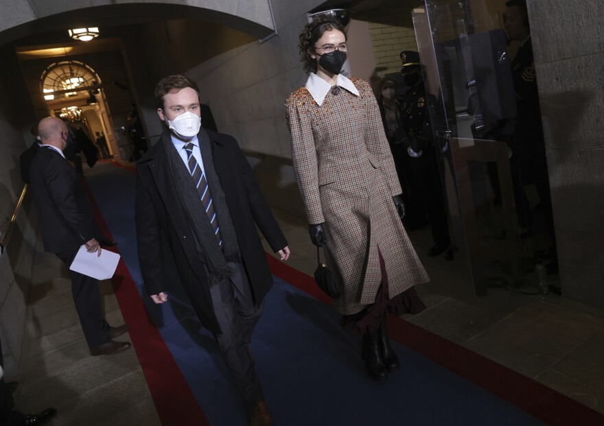 Cole Emhoff (left) and Ella Emhoff, the stepchildren of Vice President Harris, arrive for the inauguration at the Capitol.