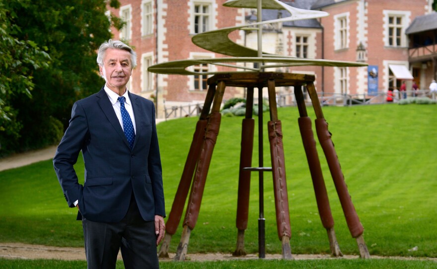 François Saint Bris, whose family owns the Clos Lucé chateau in Amboise, France, stands in front of a design by Leonardo da Vinci that has been rebuilt on the grounds. Leonardo spent the last three years of his life in France.