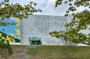 A half painted mural featuring a doodle grid
