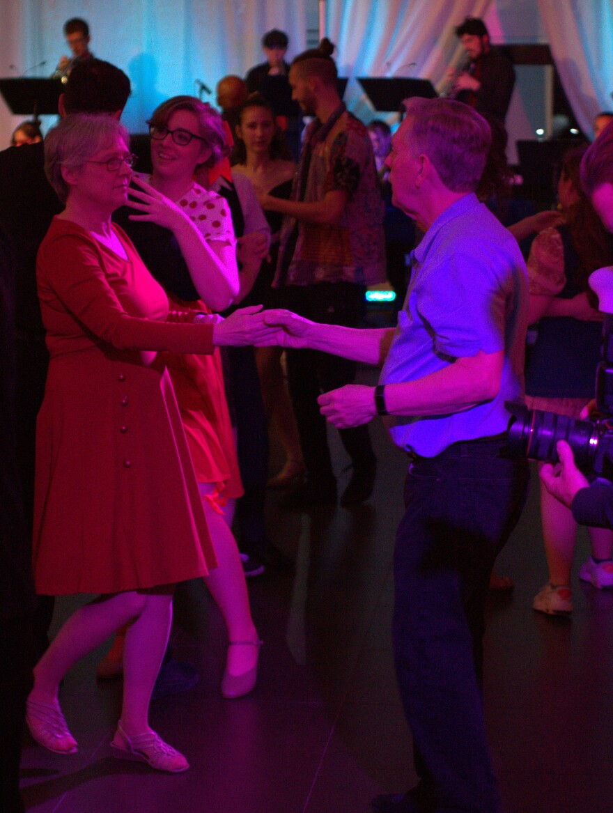 Couples use their newfound skills to dance to live music at the Valentine's Swing Dance hosted by Santa Fe College on Friday, Feb. 14, 2025. Many people learned the basics of swing thanks to the event. (Jack Vincent/WUFT News)