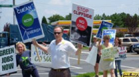 Protestors opposed to new coal plants on hand for Secretary Chu's Charlotte visit. hspace=4