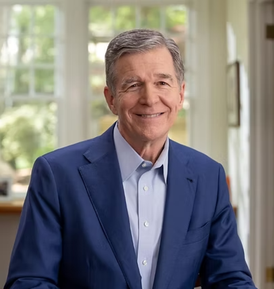 Man in button down shirt and blazer