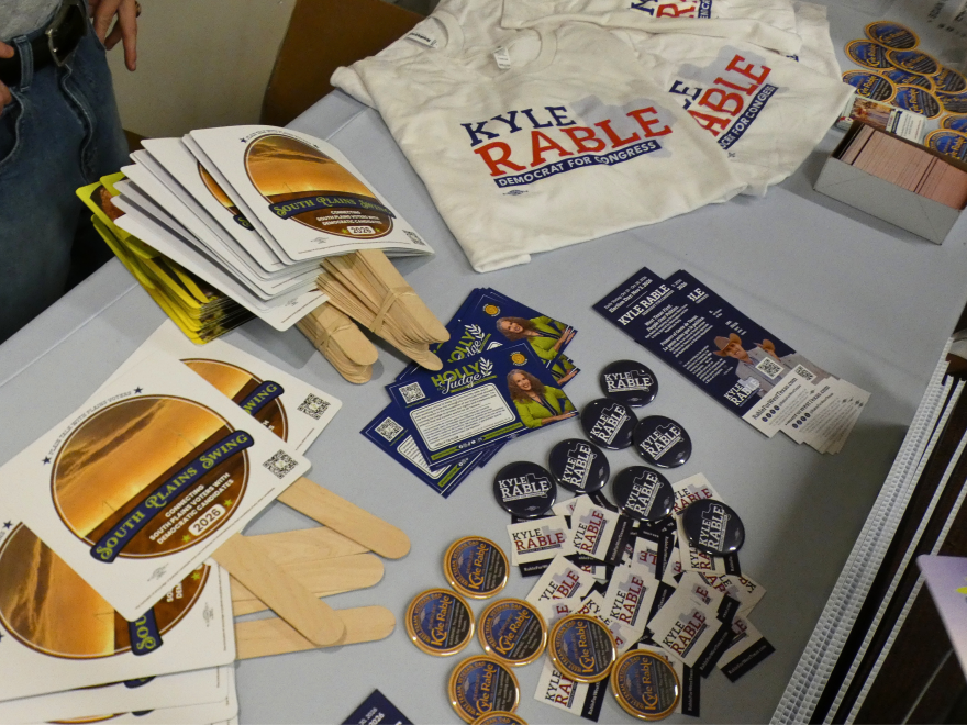 Kyle Rable’s campaign materials are displayed on a table after Monday's event.