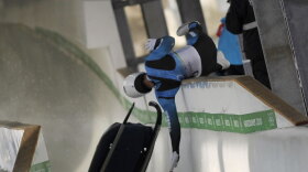 Georgian luger Nodar Kumaritashvili crashes during practice Friday at in Whistler, British Columbia.