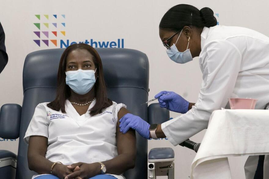  Sandra Lindsay, a nurse at Long Island Jewish Medical Center, is inoculated with the Pfizer COVID-19 vaccine, Dec. 14, 2020. 
