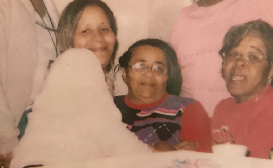 Ina Knox, seated, surrounded by her daughters during a family birthday party eight years ago. Toni Gayle, Knox's sixth child of eight, sits on her mother's lap.