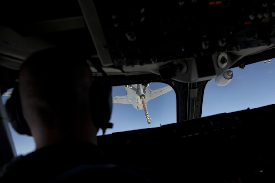An E4-B military aircraft with U.S. Defense Secretary Ash Carter aboard, approaches an KC-135 refueler aircraft for aerial refueling over the Atlantic Ocean, Sunday, July 19, 2015, en route to Tel Aviv, Israel, from Andrews Air Force Base, MD. Carter is traveling to Israel to talk with officials there as well as Jordan and Saudi Arabia, U.S. allies whose leaders also are worried about the Iran nuclear deal's implications. (AP Photo/Carolyn Kaster, Pool)