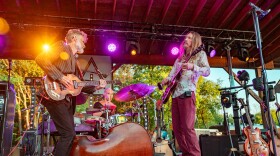 Bassist Chris Wood (left), multi-instrumentalist Jano Rix (center), and guitarist Oliver Wood (right) performing in Accord in 2025.