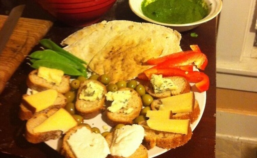 From <a href="http://dinnertimeconfessional.tumblr.com/post/44544479837/this-is-dinner-for-my-boyfriend-and-me-he-usually#posts">KF</a> in Champaign, Ill.: Baba ghanoush, a spicy cilantro chutney with bread, and veggies for dipping