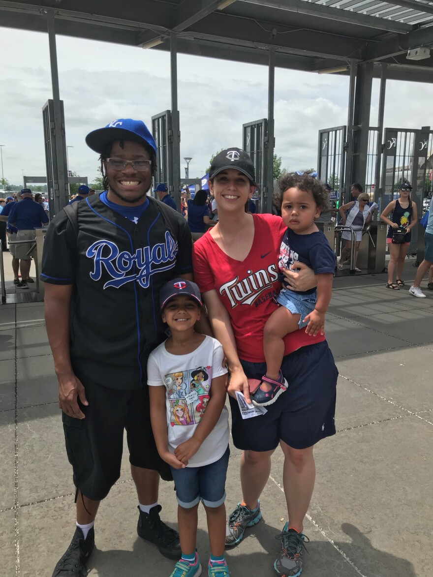 Alyssa Rogers attends a Royals game with her husband, Burt, and their daughters Maya and Jasmine. She doesn't think social gatherings will be safe this summer, and she's reluctant to send her daughters back to child care.