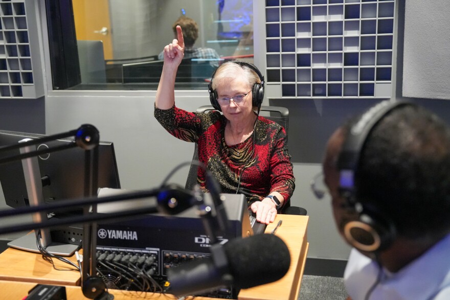 Broadcast producer Mary Edwards signals the start of rehearsals before a November 7 concert at Powell Hall.