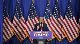 FILE - Republican presidential candidate former President Donald Trump speaks at a campaign rally, March 2, 2024, in Richmond, Va. A lawsuit settlement offers new details about how two attorneys for former President Donald Trump orchestrated a plan for fake electors to file paperwork falsely saying the Republican won Wisconsin in a strategy to overturn Democrat Joe Biden’s 2020 victory there and in other swing states. The agreement settles a civil lawsuit filed by Democrats against the attorneys and the fake electors. (AP Photo/Steve Helber, File)