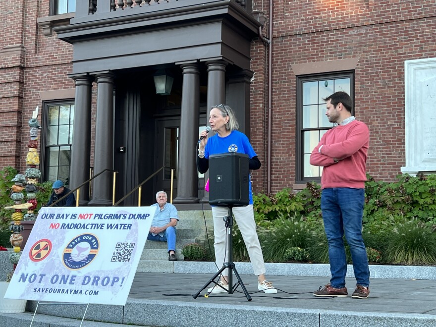 Activist Diane Turco speaks at a rally Monday on the lawn of Plymouth Town Hall against the discharge of radioactive water from the Pilgrim Nuclear Power Station. With her is Mark DeCristoforo, executive director of the Massachusetts Seafood Collaborative.