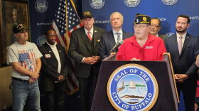 Gabriel Rodriguez American Legion Post Commander John Samabria, standing at lectern, describes his goals for veteran advocacy.