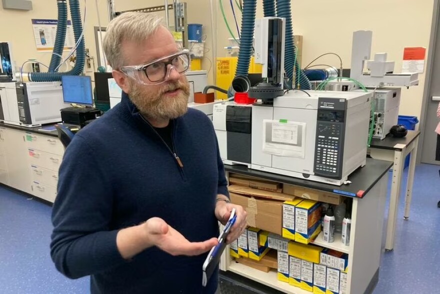 Ben Clark, senior vice president of engineering of Inpria, talks to journalists at the company's lab in Corvallis, Ore., on March 3, 2023. Government officials want to attract more semiconductor-related businesses to Oregon and state lawmakers are considering a bill that would allow the governor to expand urban growth boundaries for chip factories.