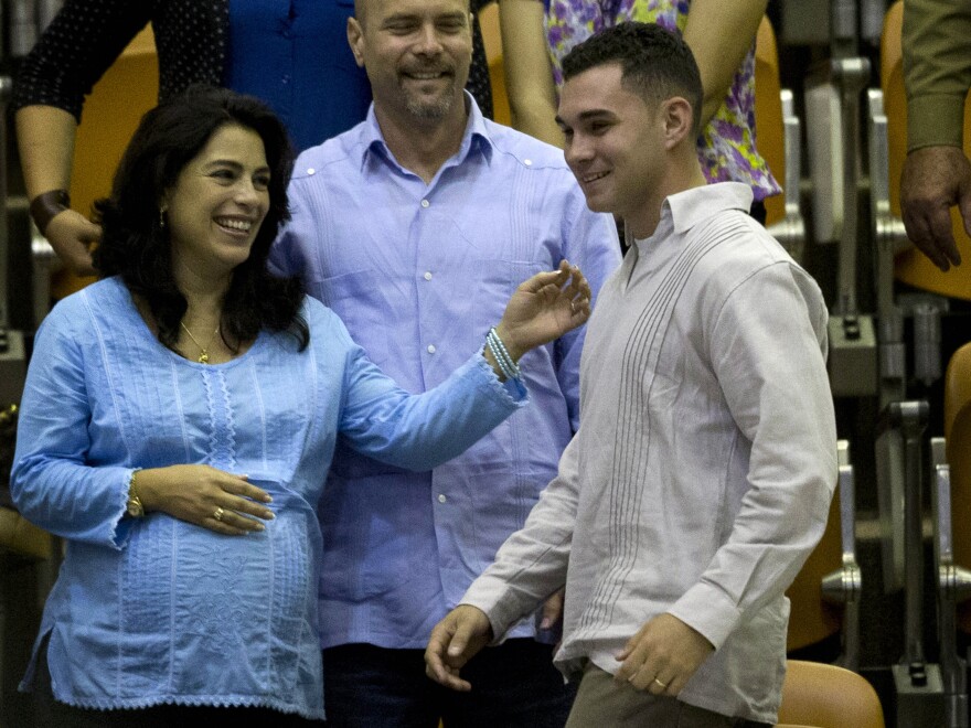 González, pictured here in Dec. 2014, at the closing ceremony of the legislative session at Cuba's National Assembly, is 21 now and an engineering student.