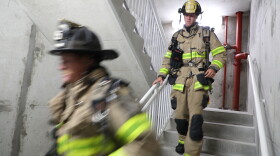 Firefighters take part in the annual Navarre Beach Stair Climb on Friday morning.