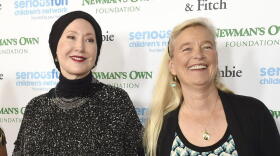 FILE — Susan Newman, left, and Nell Newman arrive at the SeriousFun Children's Network event at the Dolby Theatre, May 14, 2015, in Los Angeles. A new lawsuit filed Tuesday, Aug. 23, 2022, has exposed a deep rift between two of Paul Newman's daughters and the late actor's charitable foundation, over how it gives away some of the millions of dollars it makes off the Newman's Own line of food and drink products.