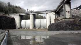 The spillway doors at the Howard Hanson Dam. A red mark on the left door indicates the highest water the dam ever saw, in 2009. This revealed weaknesses in the dam that have since been fixed, but storms could bring higher water someday.