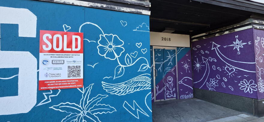 A "Sold" sign is posted outside 2018 Main Street in Niagara Falls. The historic building and its neighboring property at 2010 Main Street are slated for a proposed $25 million redevelopment that would bring 100 student housing units to the city's Main Street corridor.