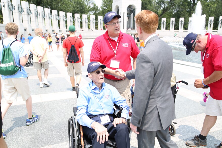 U.S. Sen. James Lankford speaks with World War II veterans at the National World War II Memorial in Washington, D.C. on June 10, 2015.