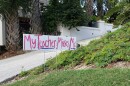 A sign reading "My Teacher Misses Me" outside of an Atlantic Beach home.