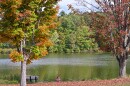 A woman sits by the lake in Frances Slocum State Park, in Luzerne County, in late September 2025.